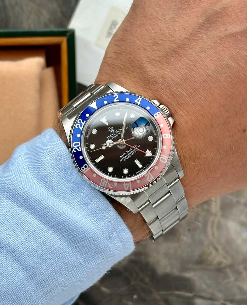 Wrist shot image for Rolex GMT-Master "Pepsi" 16700 Black 1997 with original box and papers