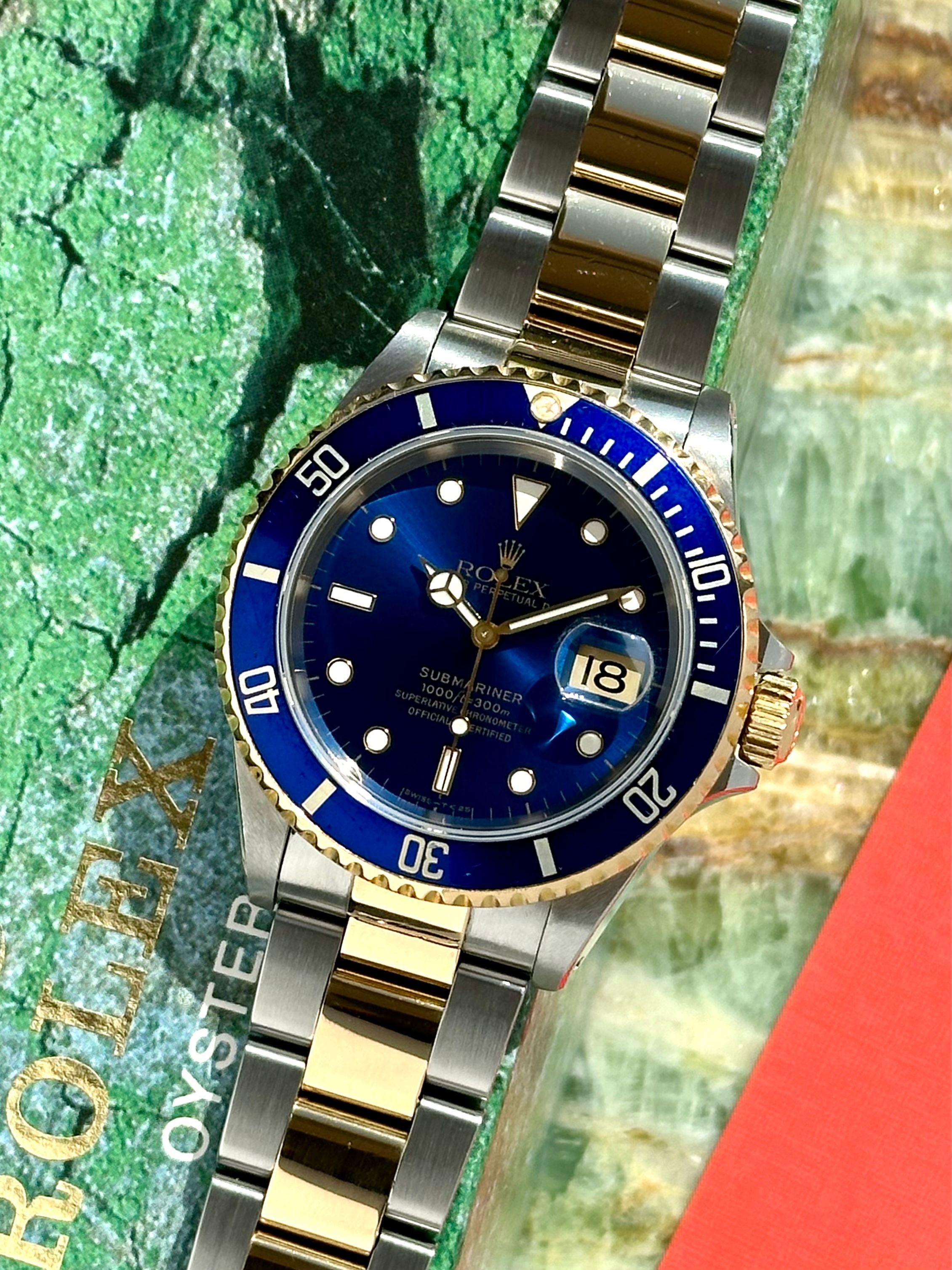 Rolex Submariner 16613 Blue 1996 with original box and papers