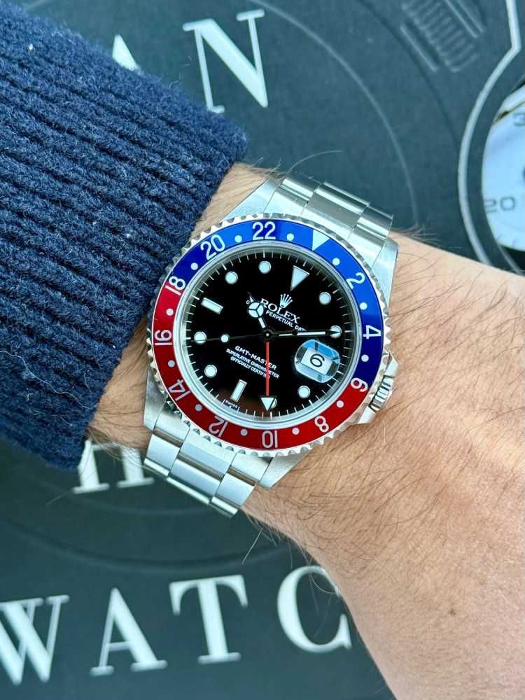 Wrist shot image for Rolex GMT-Master "Pepsi" 16700 Black 1998 with original box and papers