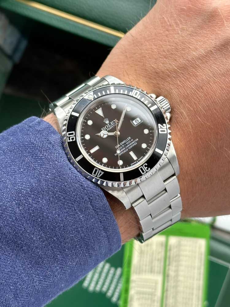 Wrist image for Rolex Sea-Dweller 16600 Black 2005 with original box and papers