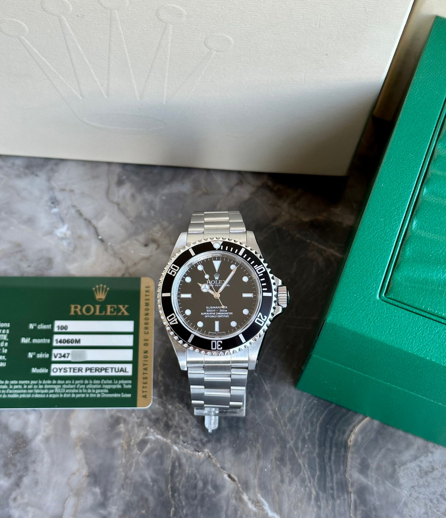 Rolex Submariner 14060M Black 2009 with original box and papers