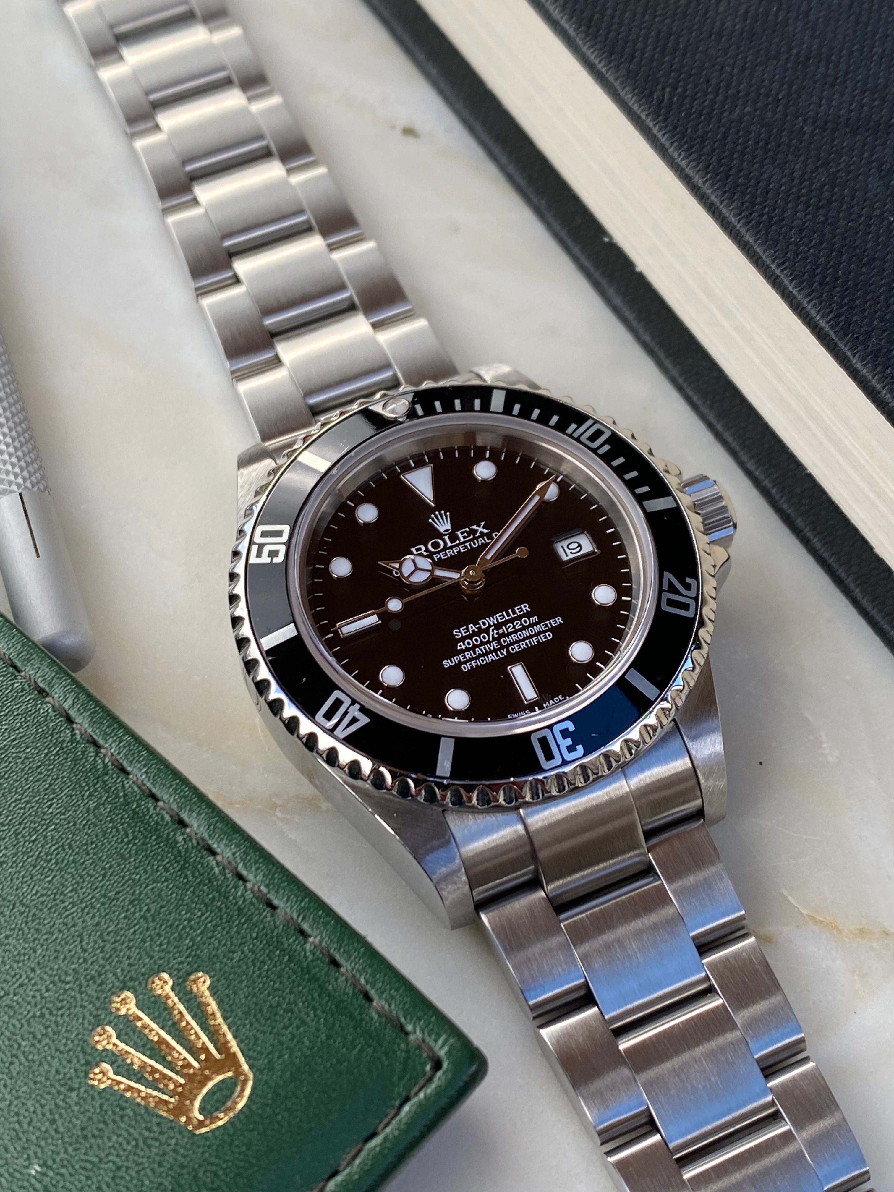 Rolex Sea-Dweller 16600T Black 2005 with original box and papers