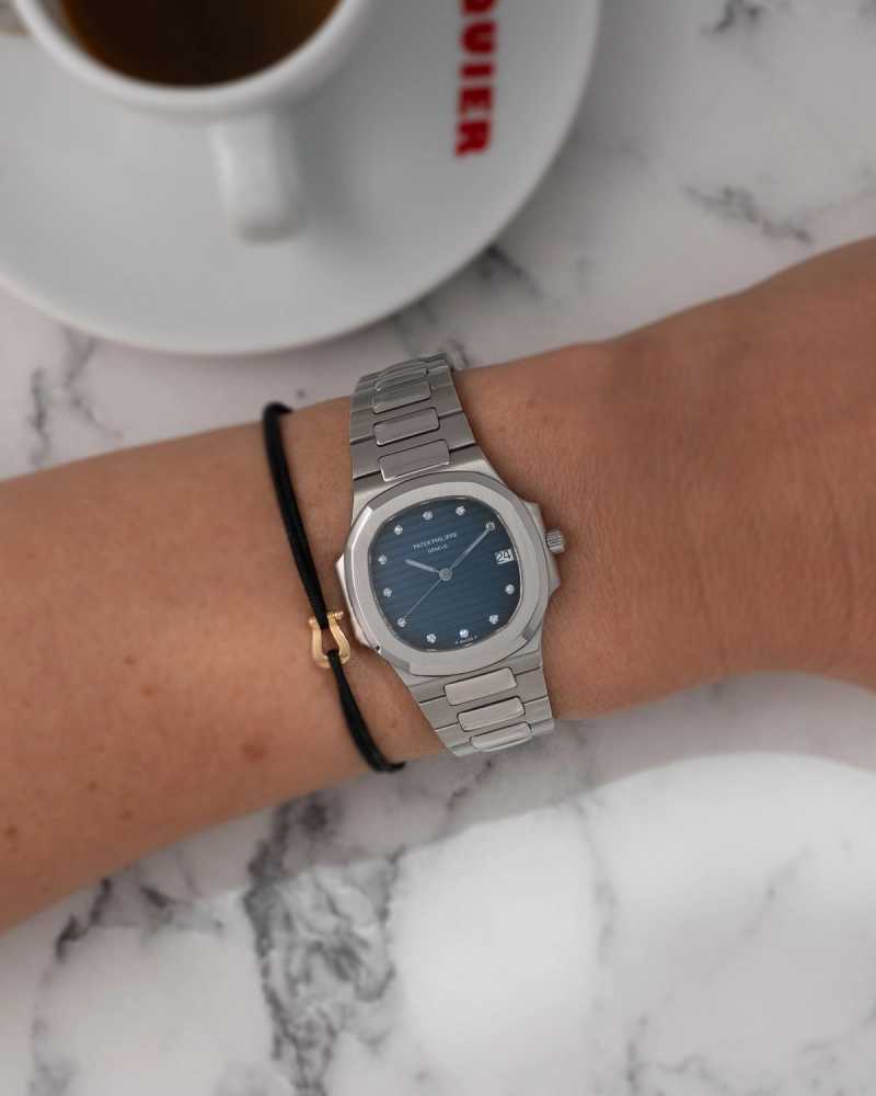 Wrist shot image for Patek Philippe Nautilus "DIAMOND" 3900 Blue 1992 with original box and papers