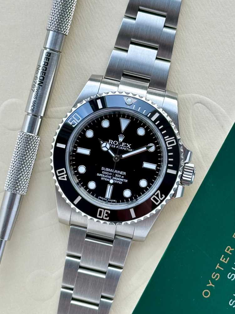 Featured image for Rolex Submariner 114060 Black 2014 with original box and papers