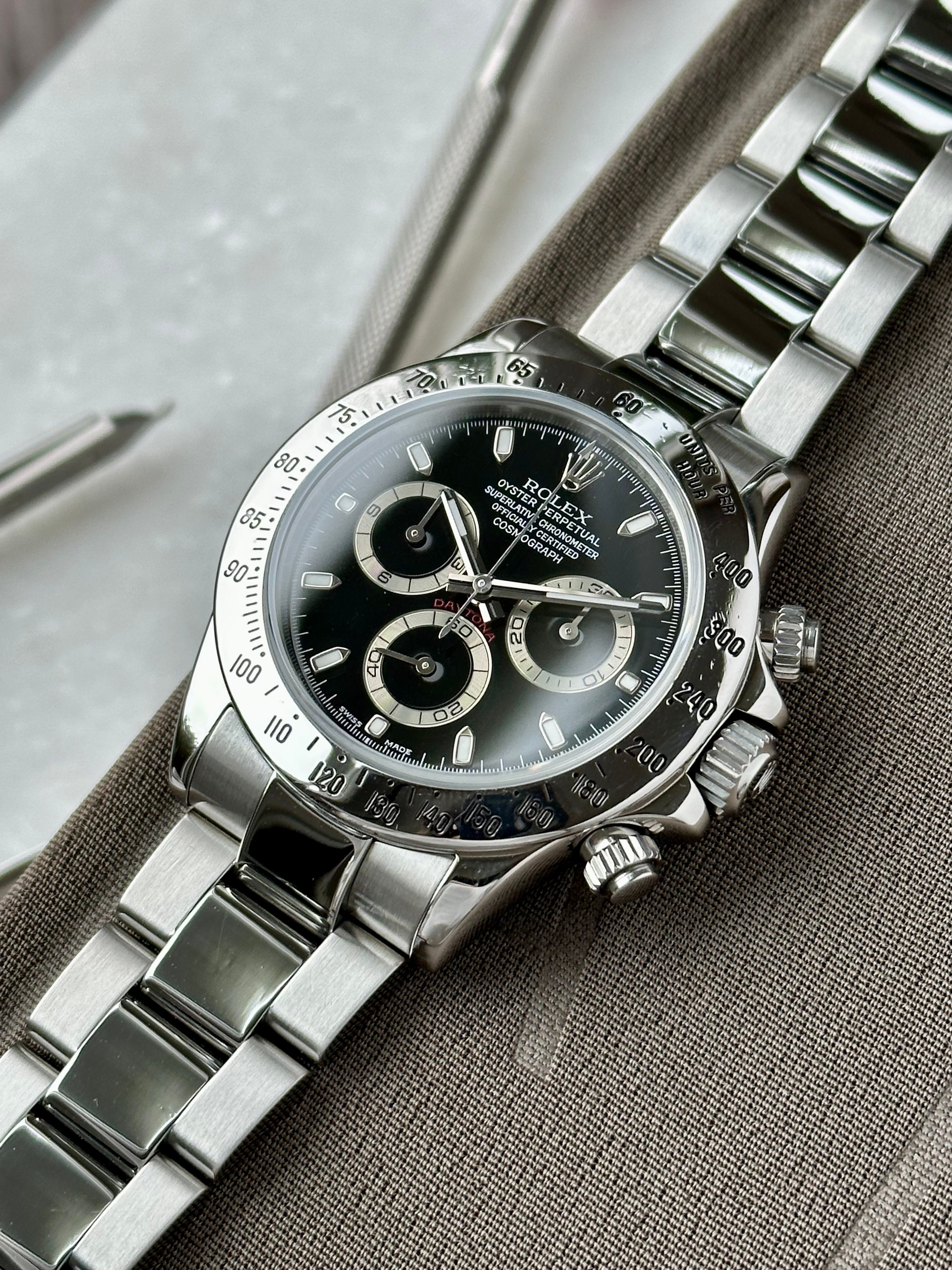 Rolex daytona black on sale 116520