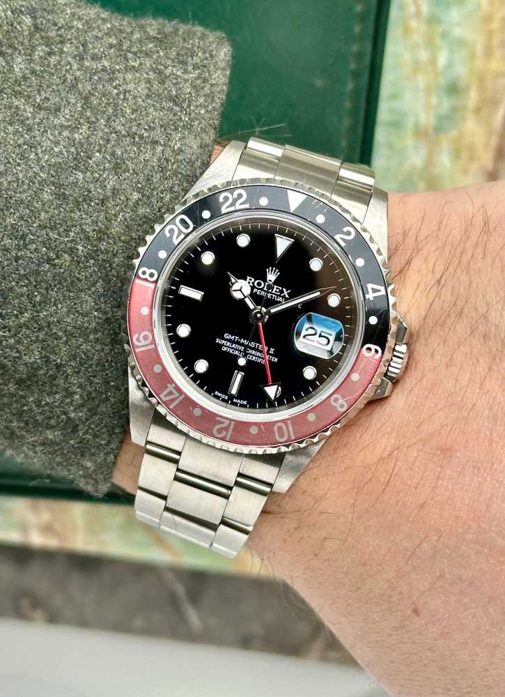 Wrist image for Rolex GMT-Master II "Coke" 16710 Black 2001 with original box and papers 2