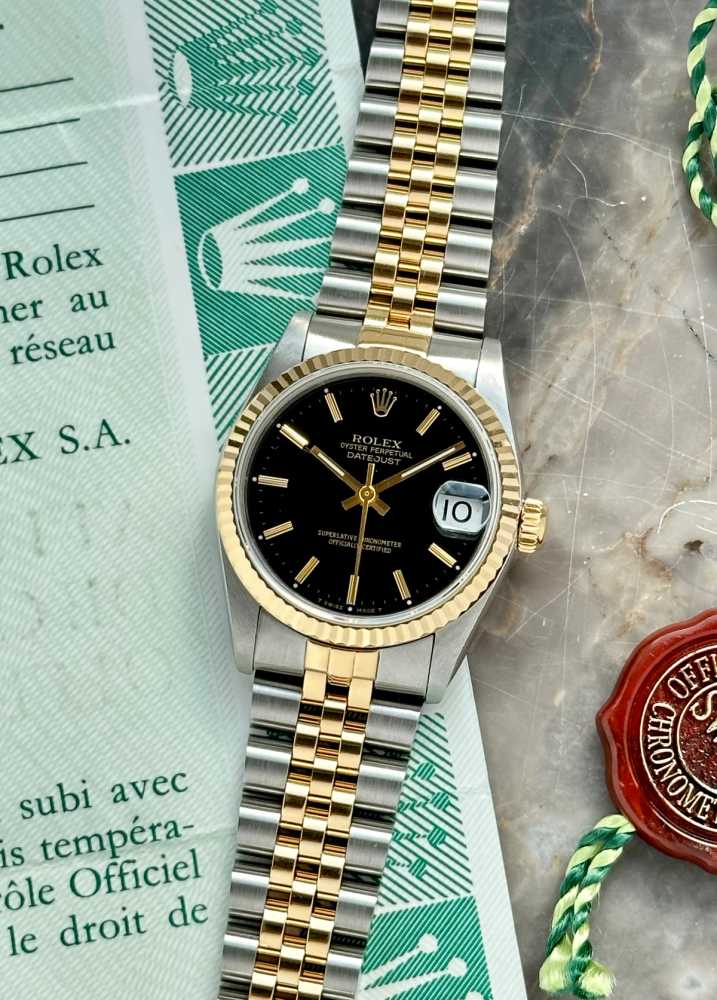 Featured image for Rolex Midsize Datejust 68273 Black 1990 with original box and papers
