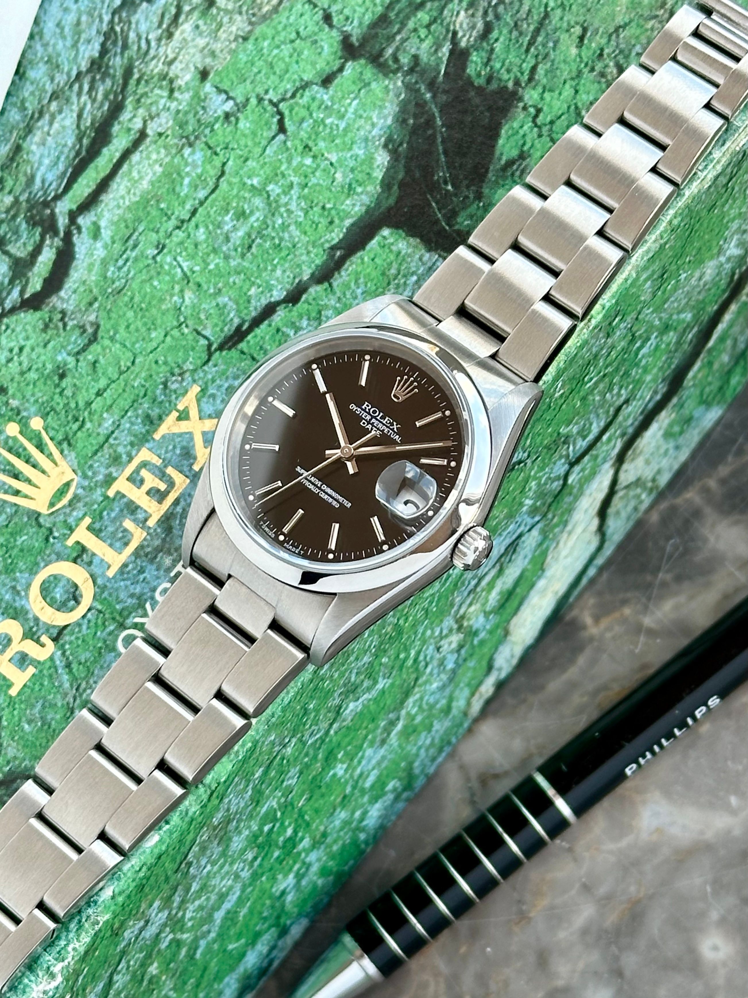 Rolex Oyster Perpetual Date 15200 Black 1995 with original box and