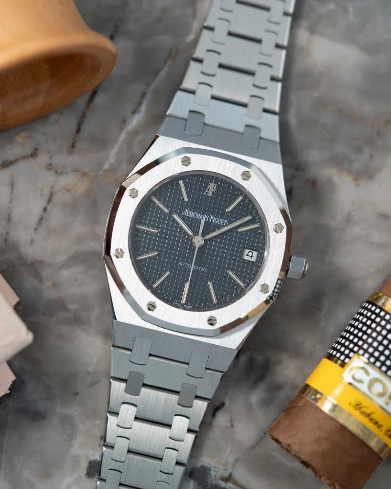 Featured image for Audemars Piguet Royal Oak "Black Dial" 14790ST Black 1998 with original box and papers