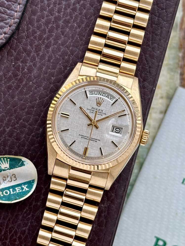 Featured image for Rolex Day-Date "Linen" 1803 Silver Linen 1972 with original box and papers