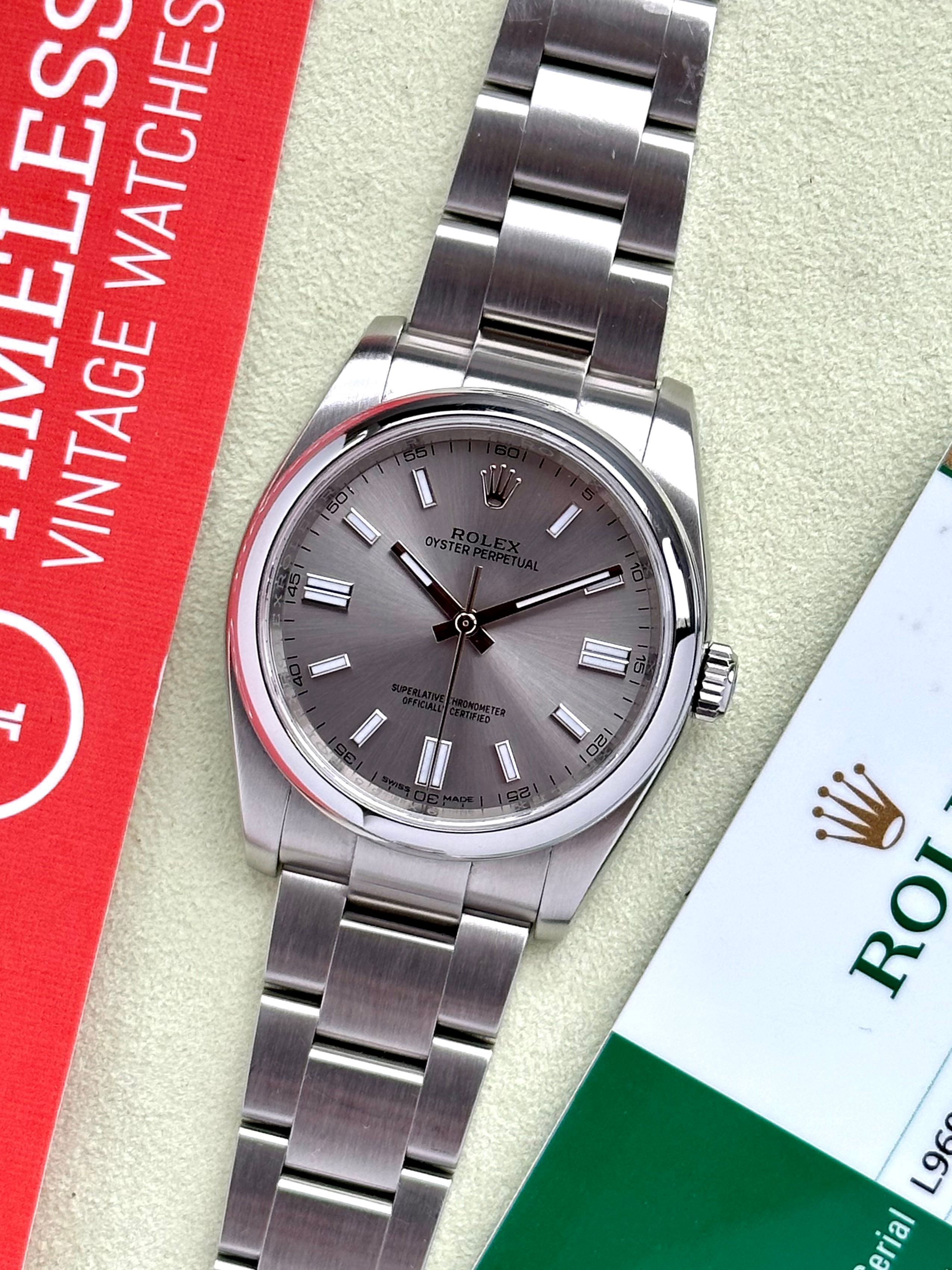 Rolex Oyster Perpetual 116000 Grey 2017 with original box and papers