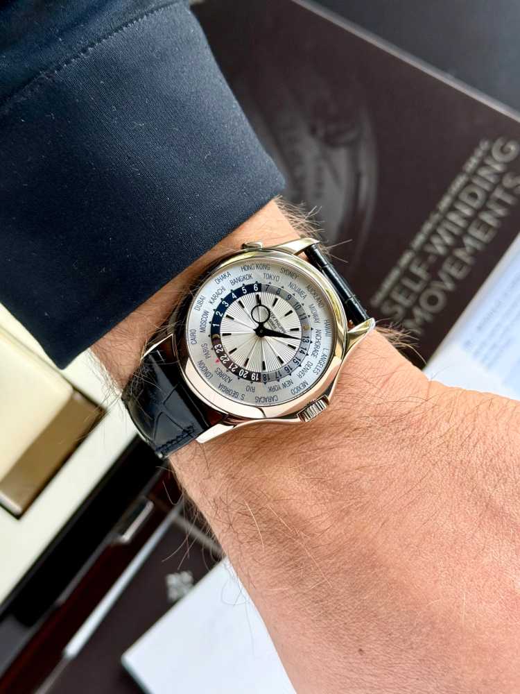 Wrist shot image for Patek Philippe World Timer 5130 G Silver 2011 with original box and papers