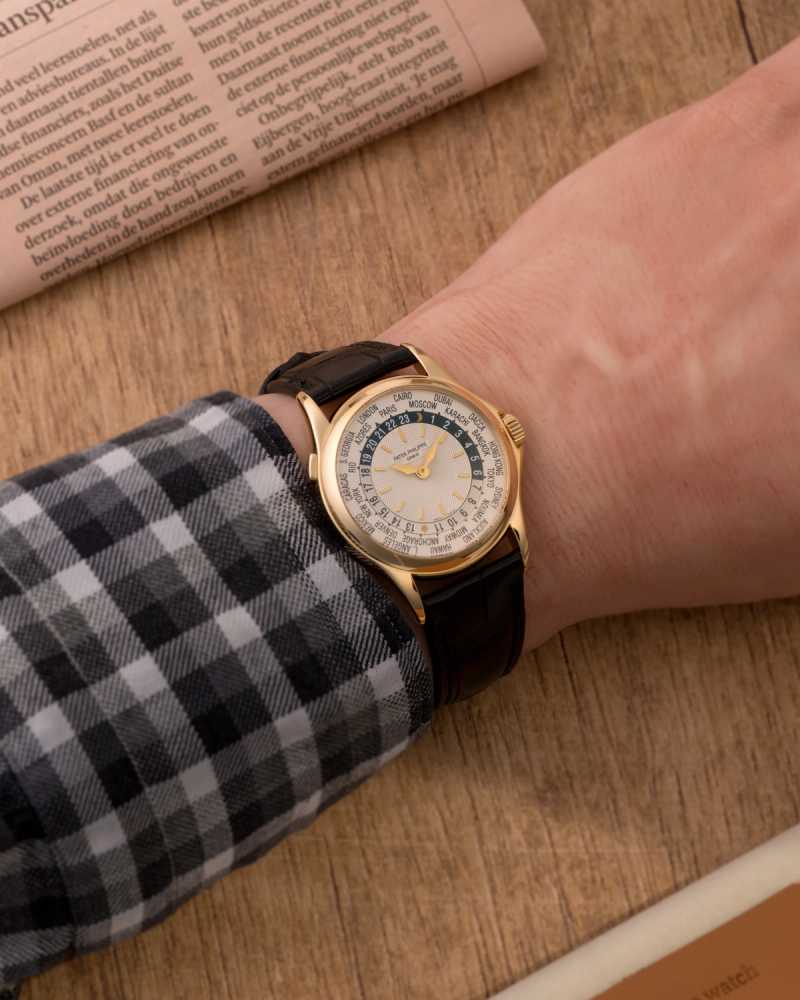 Wrist shot image for Patek Philippe World Time 5110J White 2001 with original box and papers
