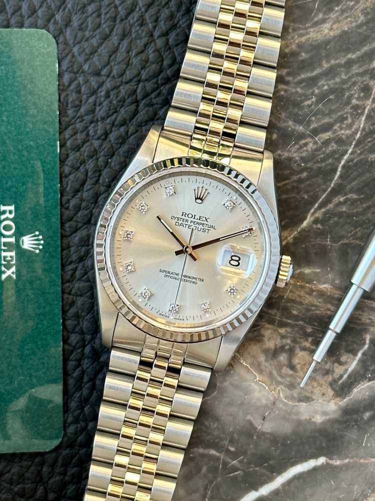 Featured image for Rolex Datejust "Diamond" 16234G Silver 1990 with original box and papers