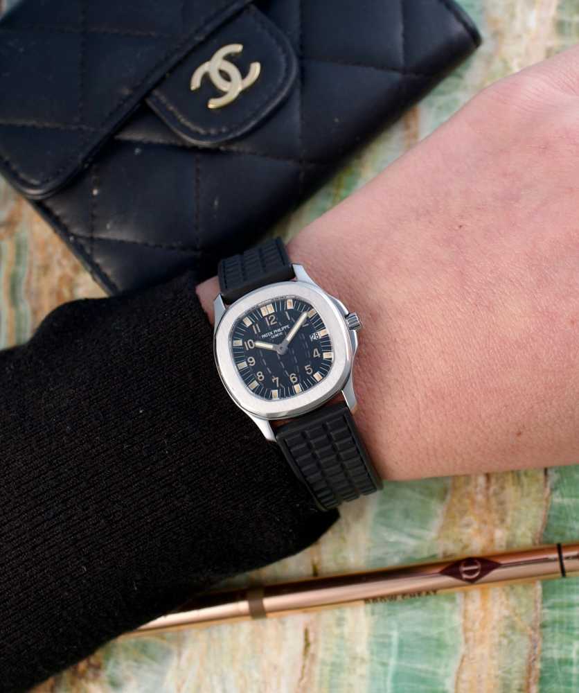 Wrist shot image for Patek Philippe Aquanaut "Patek Service" 4960 Black 1997 with original box and papers