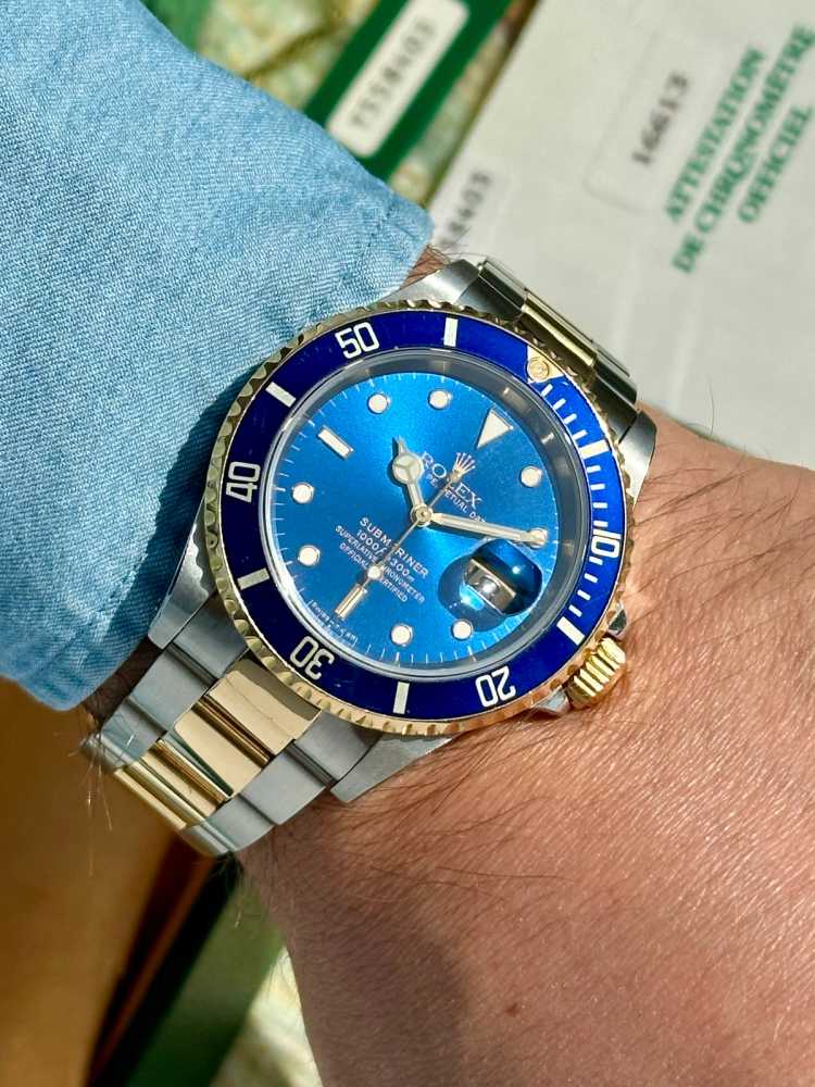 Wrist shot image for Rolex Submariner 16613 Blue 1996 with original box and papers
