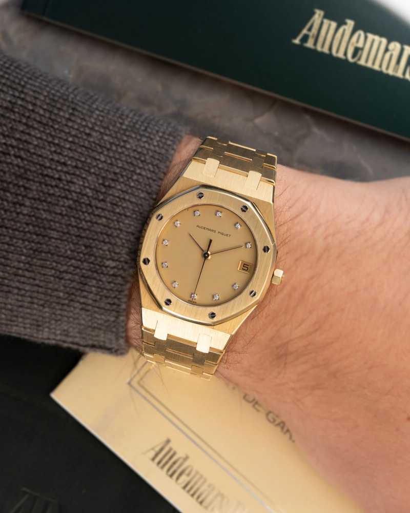 Wrist shot image for Audemars Piguet Royal Oak "Diamond" 6040 477 Gold 1984 with original box and papers