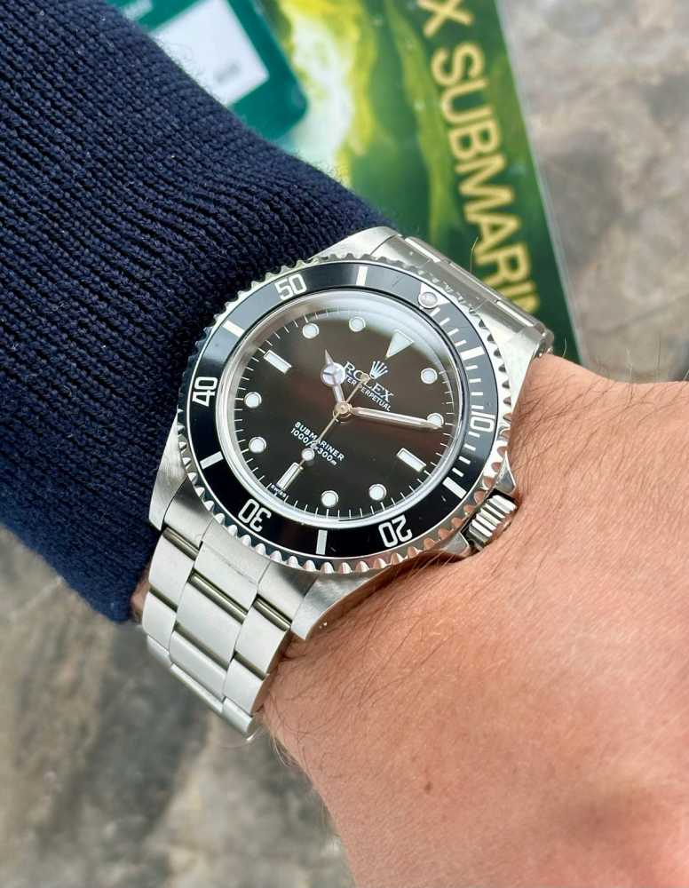 Wrist shot image for Rolex Submariner 14060 Black 1999 