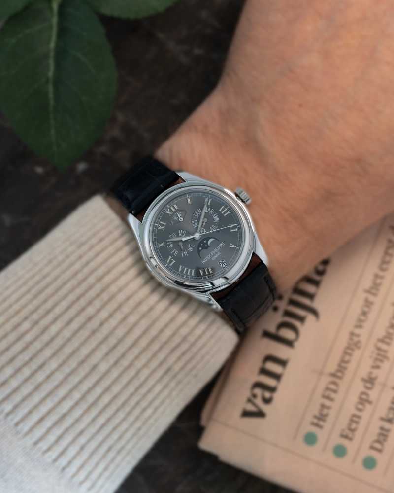 Wrist image for Patek Philippe Annual Calendar “PLATINUM” 5056P Grey 2004 with original box and papers