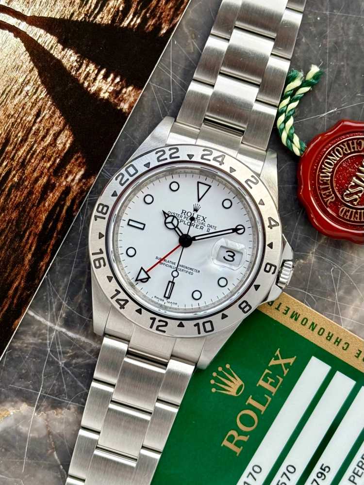 Featured image for Rolex Explorer 2 "Engraved Rehaut" 16570 T White 2009 with original box and papers