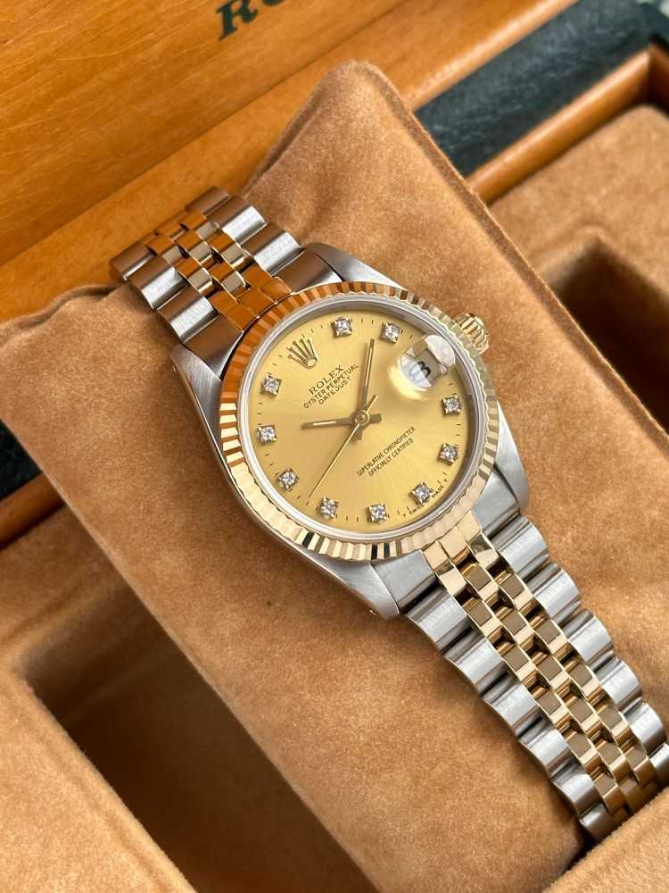 Wrist shot image for Rolex Midsize Datejust "Diamond" 68273G Gold 1993 with original box and papers 2
