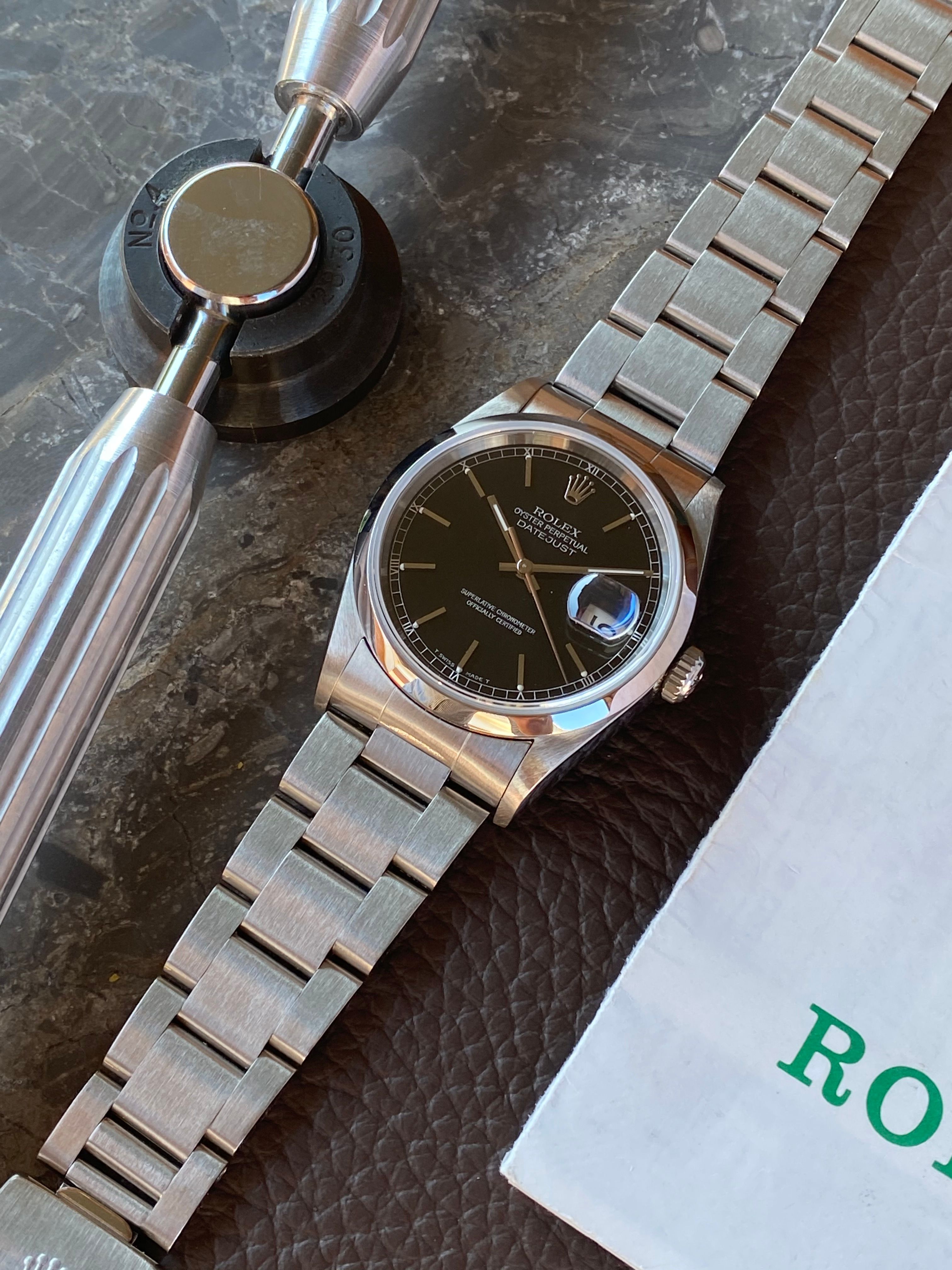 Rolex Datejust 16200 Black 1998 with original box and papers