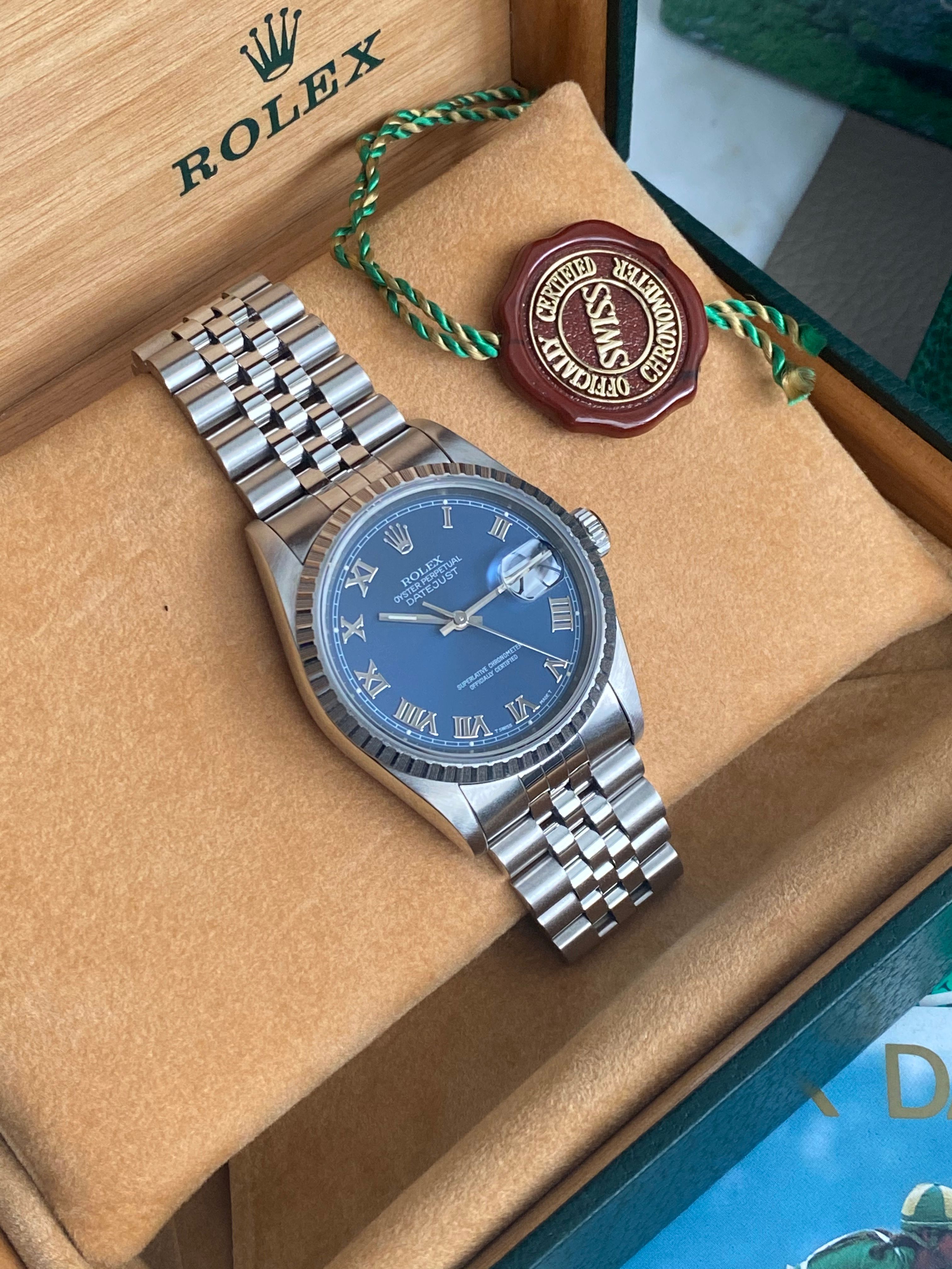 Rolex Datejust 16220 Blue 1994 with original box and papers