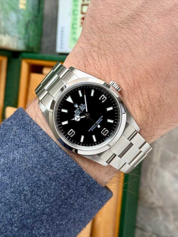 Wrist shot image for Rolex Explorer 114270 Black 2004 with original box and papers