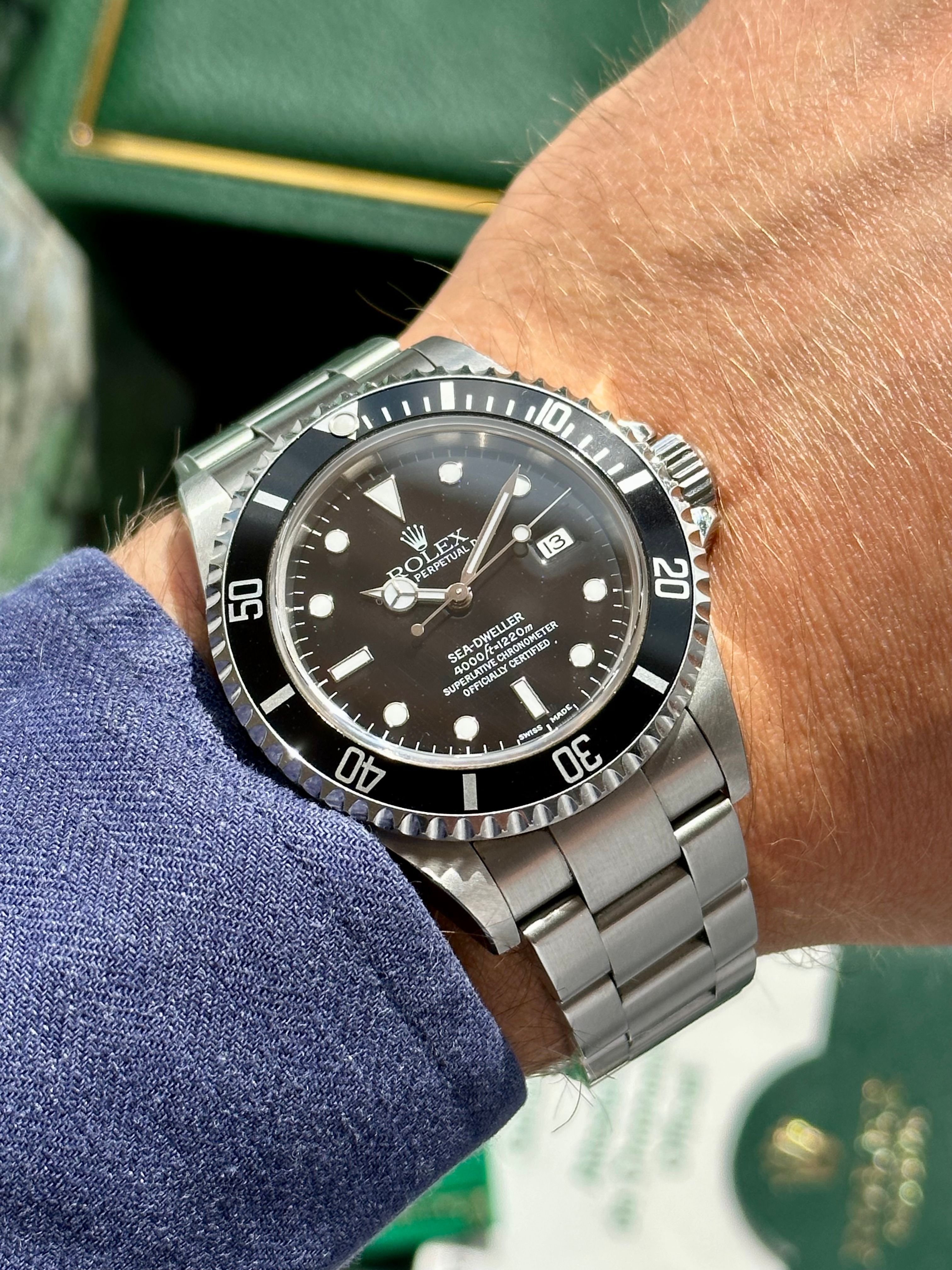 Rolex Sea Dweller 16600 Black 2004 with original box and papers