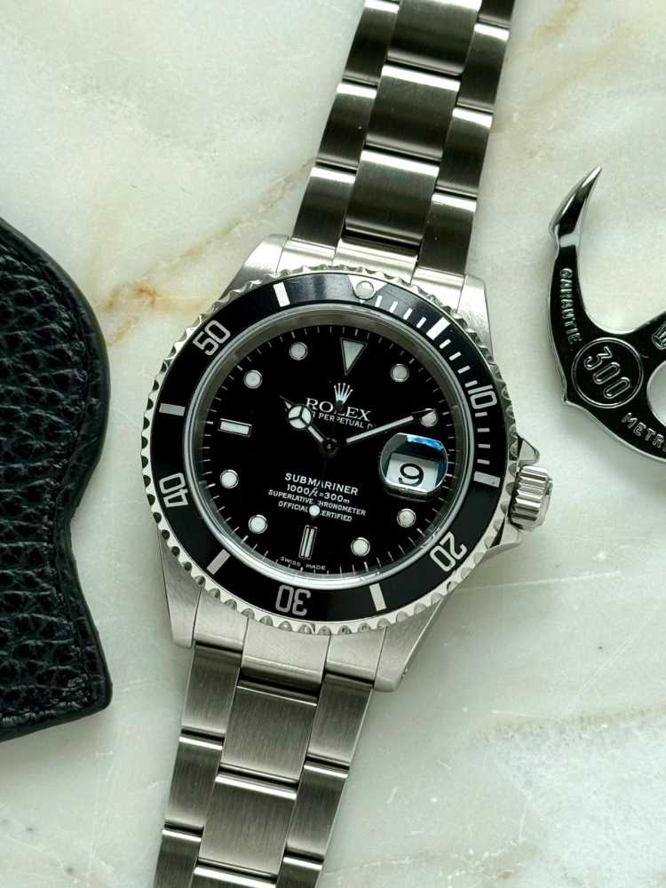 Featured image for Rolex Submariner 16610 Black 2000 with original box and papers 3