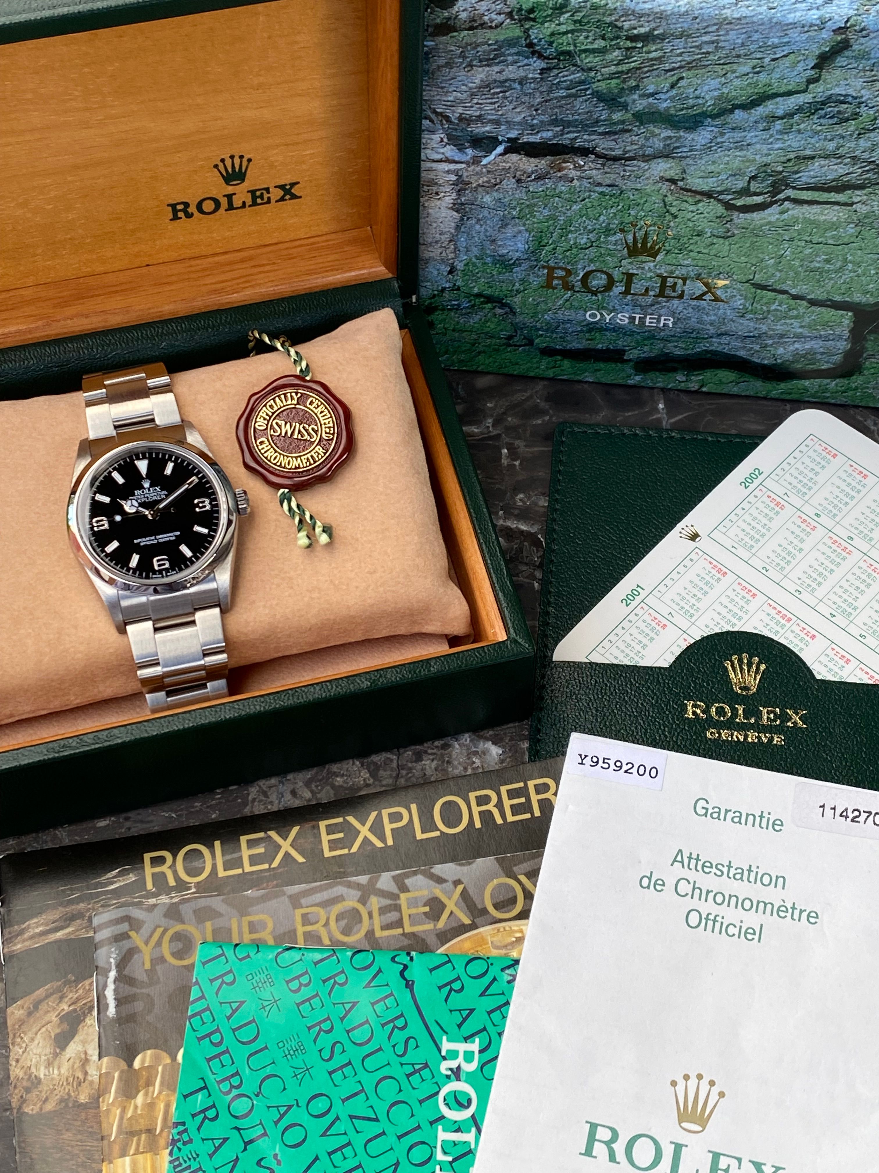 Rolex Explorer I 114270 Black 2002 with original box and papers