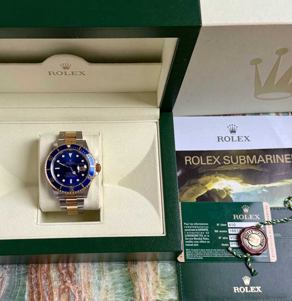Rolex Submariner 16613 Blue 2009 with original box and papers