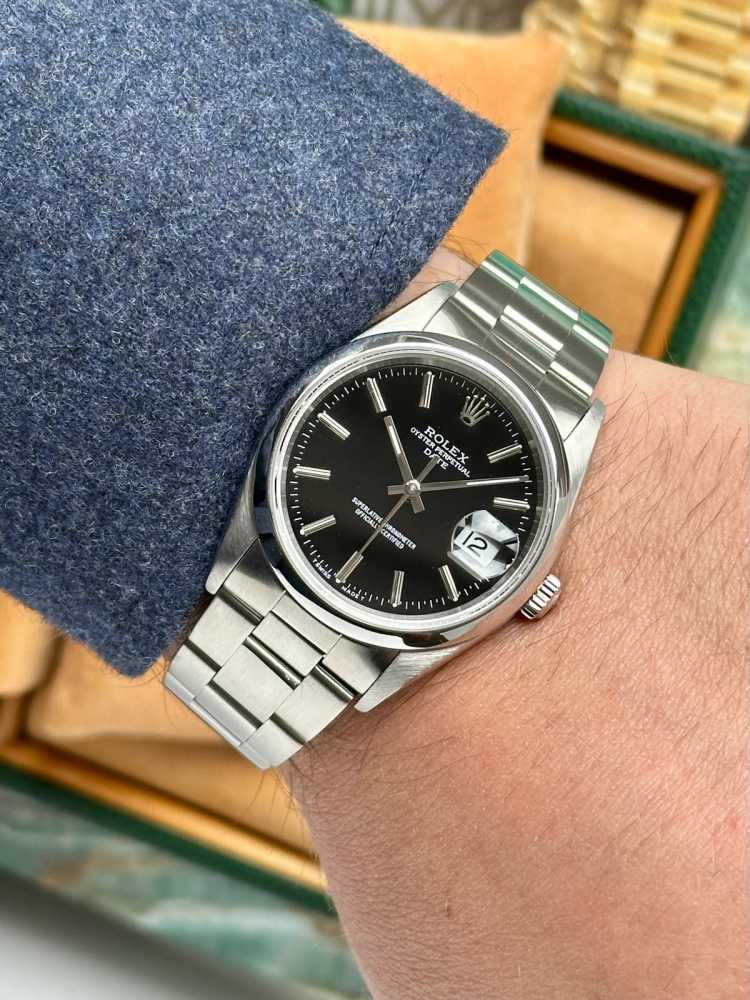 Wrist shot image for Rolex Oyster Perpetual Date 15200 Black 1993 with original box and papers
