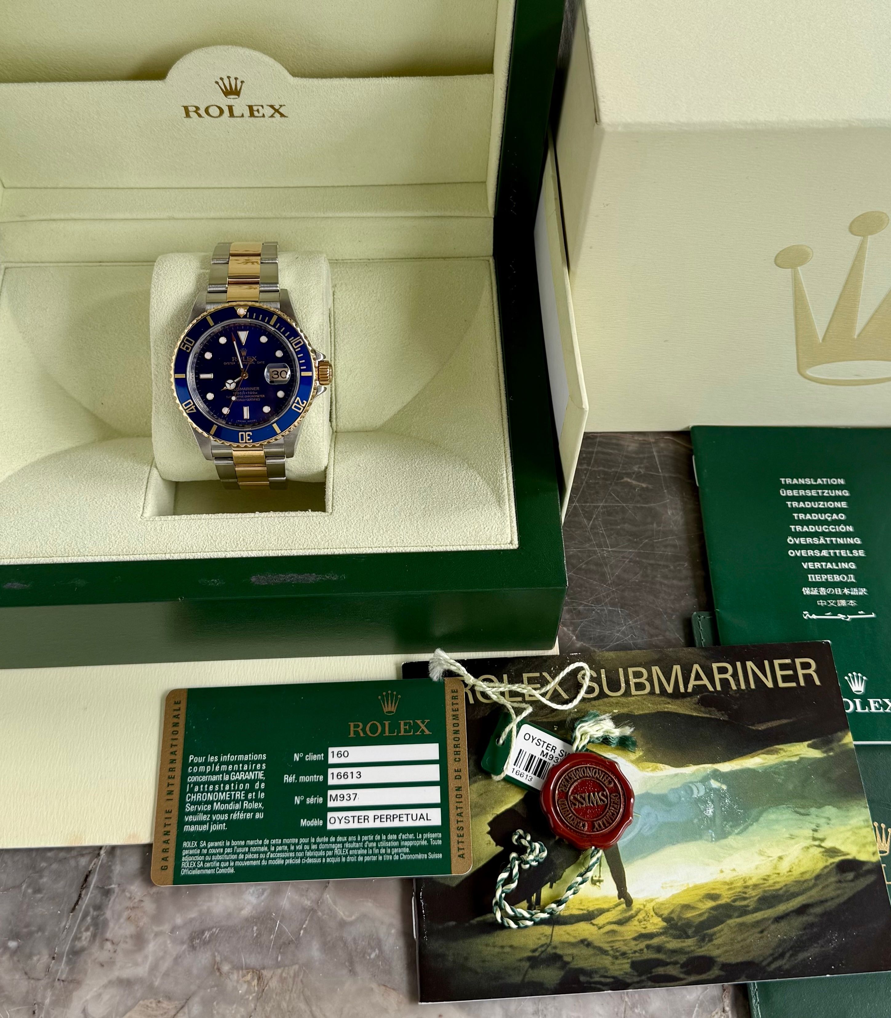 Rolex Submariner 16613 Blue 2008 with original box and papers