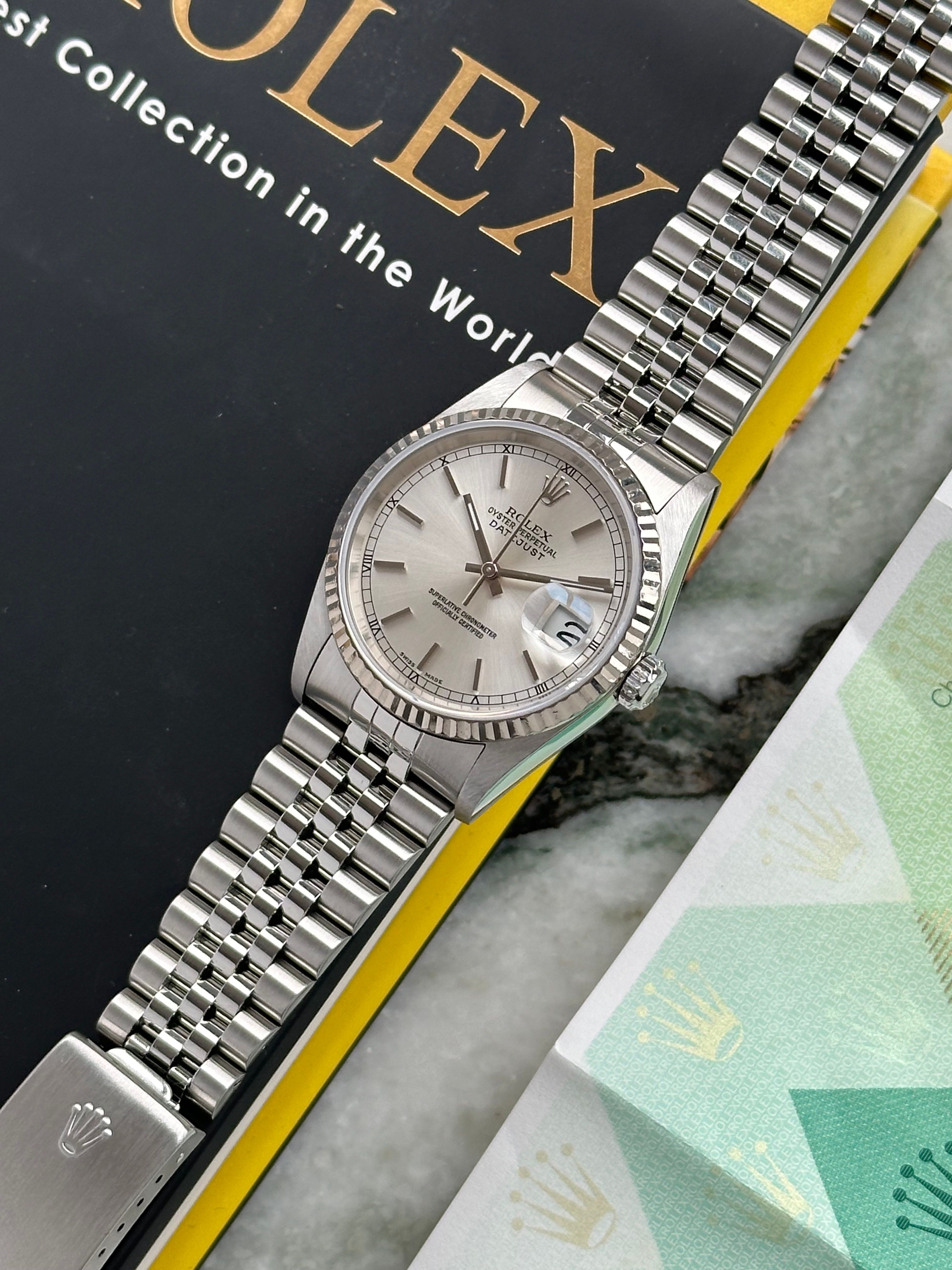 Rolex Datejust 16234 Silver 2004 with original box and papers