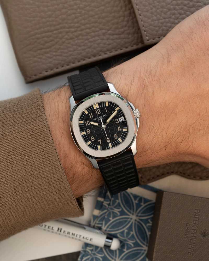 Wrist shot image for Patek Philippe Aquanaut 5060 Black 1997 with original box and papers