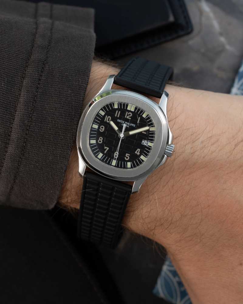 Wrist shot image for Patek Philippe Aquanaut 5064 Black 2006 with original box and papers