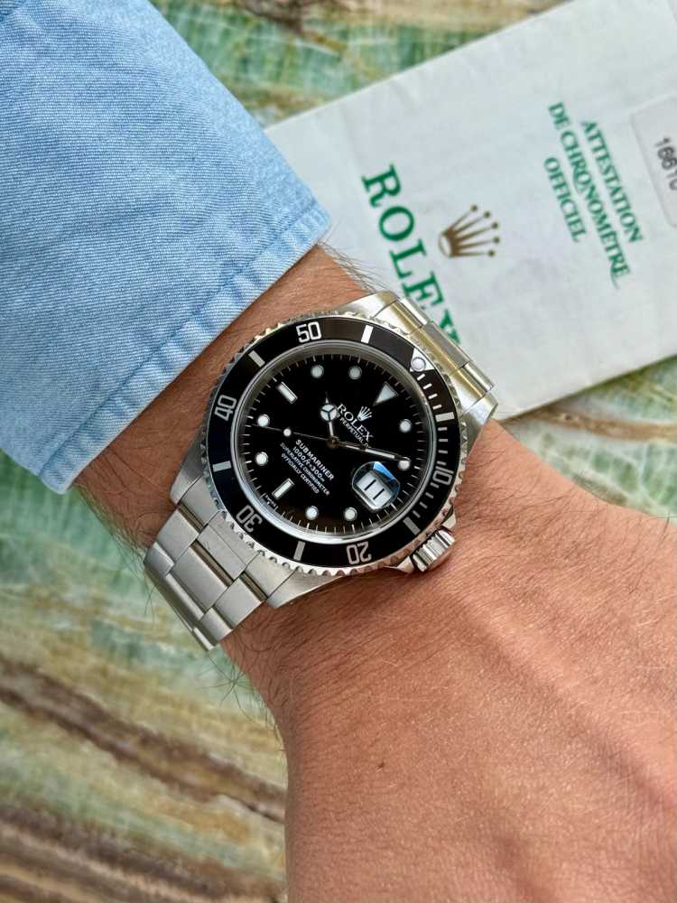 Wrist shot image for Rolex Submariner 16610 Black 1999 with original box and papers 3