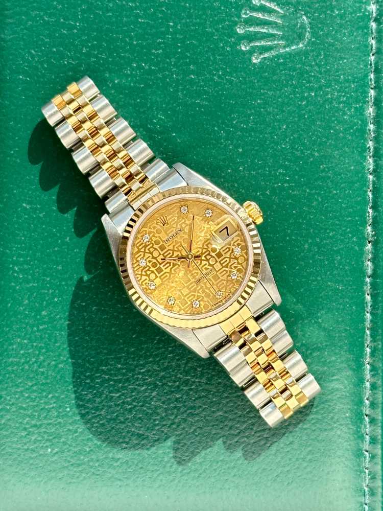 Wrist image for Rolex Midsize Datejust "Diamond" 68273 Gold 1984 with original box and papers