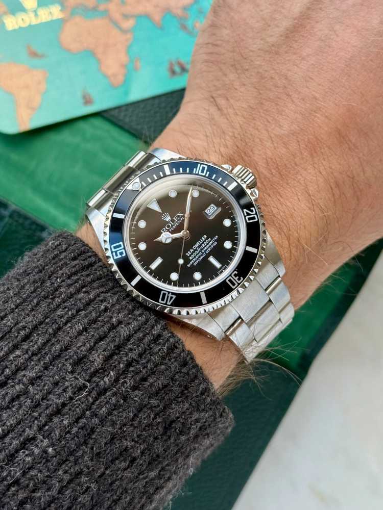 Wrist shot image for Rolex Sea-Dweller 16600 Black 1999 with original box and papers 2