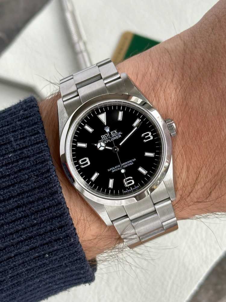 Wrist image for Rolex Explorer 114270 Black 2009 with original box and papers
