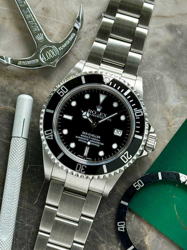Featured image for Rolex Sea-Dweller "Rolex Service" 16600 Black 2002 with original box and papers