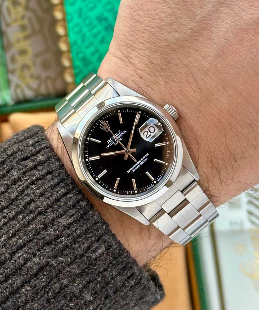 Wrist shot image for Rolex Oyster Perpetual Date 15200 Black 1995 with original box and papers