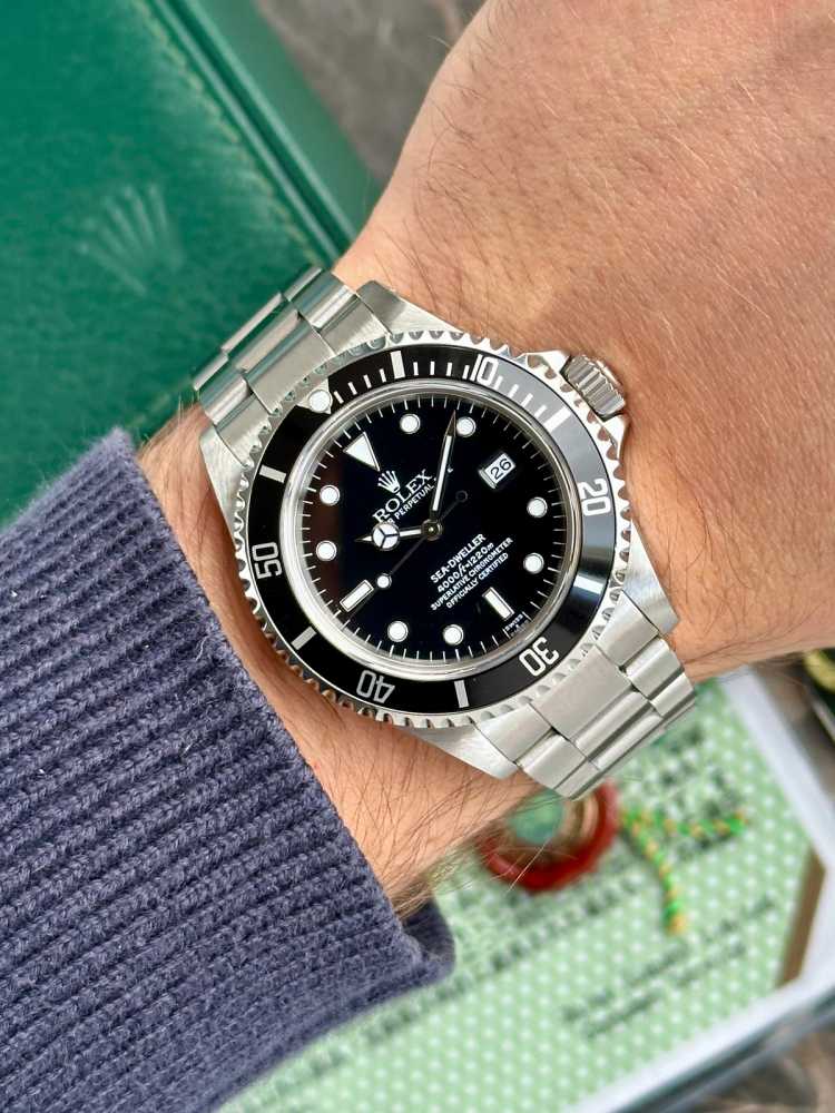 Wrist image for Rolex Sea-Dweller "Swiss" 16600 Black 1999 with original box and papers