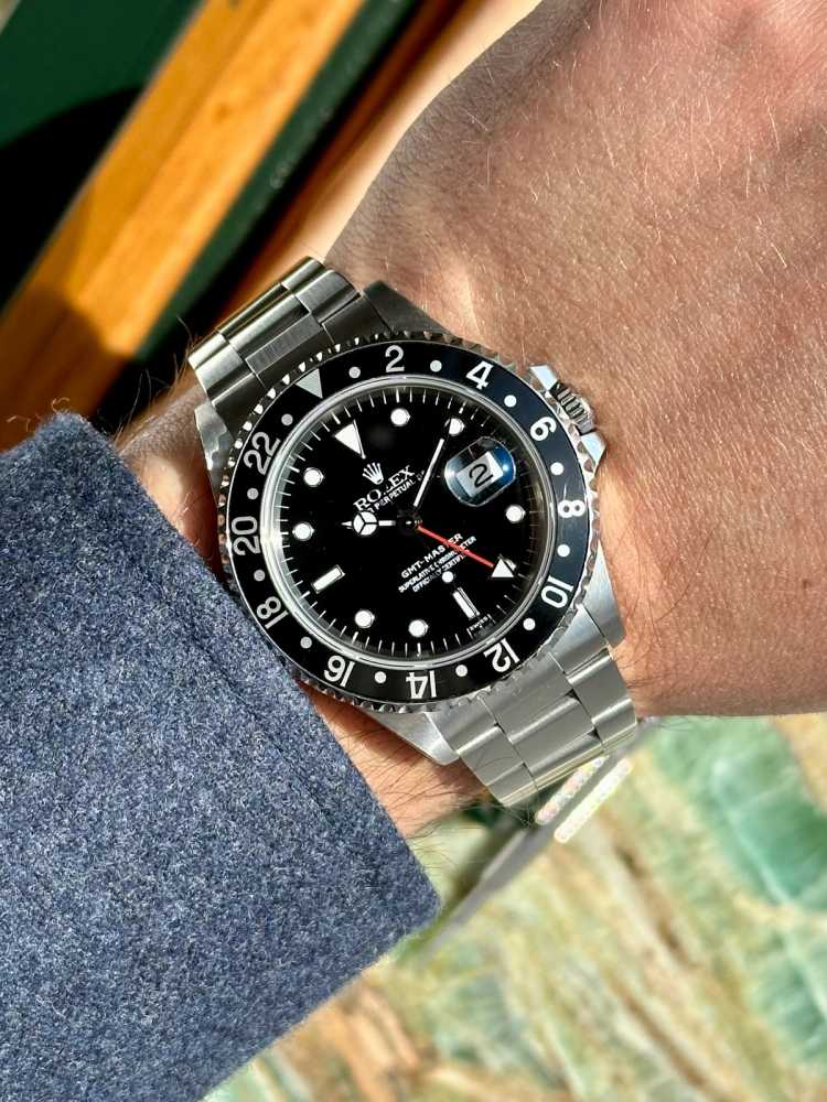 Wrist shot image for Rolex GMT-Master "Swiss" 16700 Black 1998 with original box and papers