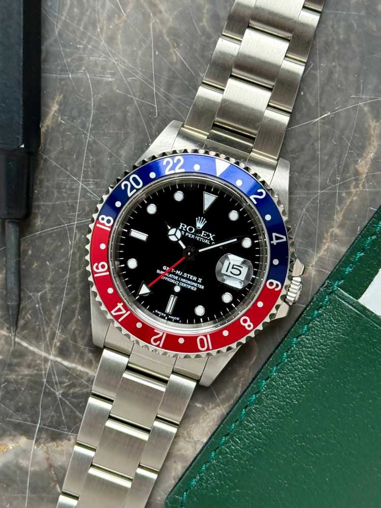 Featured image for Rolex GMT-Master II "Pepsi" 16710 Black 1999 with original box and papers 3