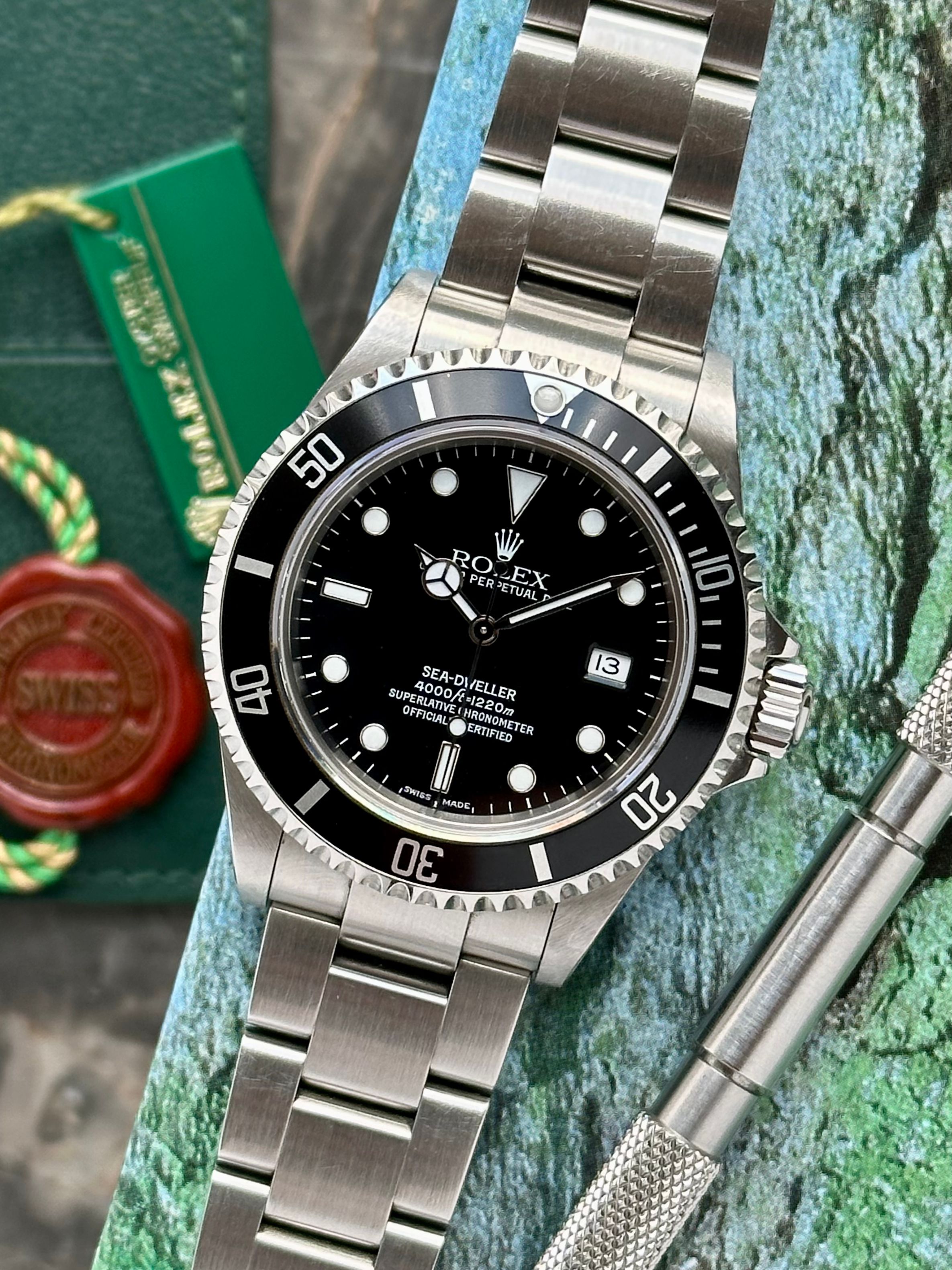 Rolex Sea Dweller 16600 Black 2004 with original box and papers