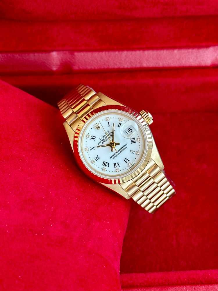 Wrist shot image for Rolex Lady-Datejust "Diamond" 69178G White 1988 with original box and papers