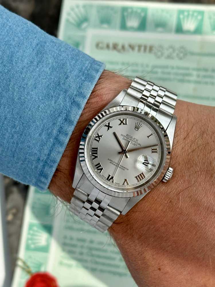 Wrist shot image for Rolex Datejust "Roman" 16234 Silver 2001 with original box and papers