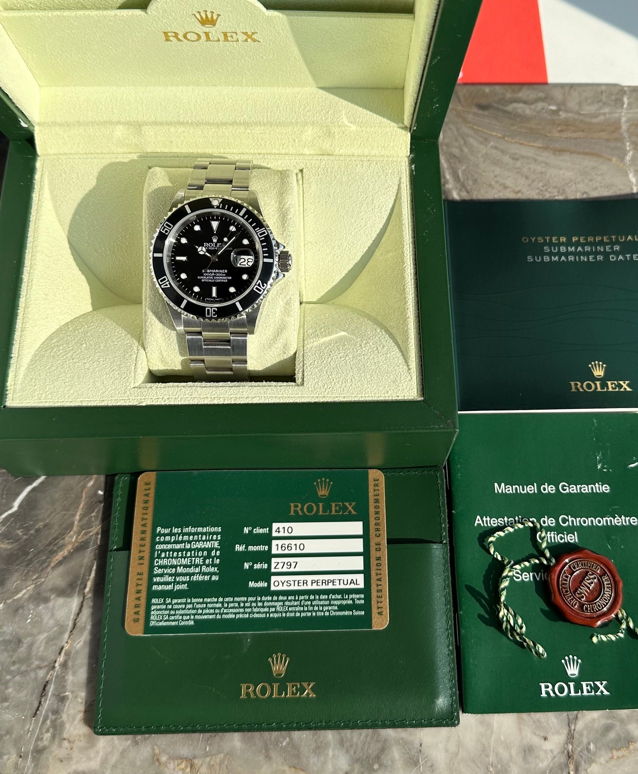 Rolex Submariner 16610 T Black 2007 with original box and papers